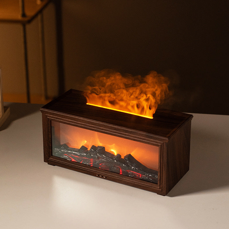 Automatic spray fireplace flame diffuser