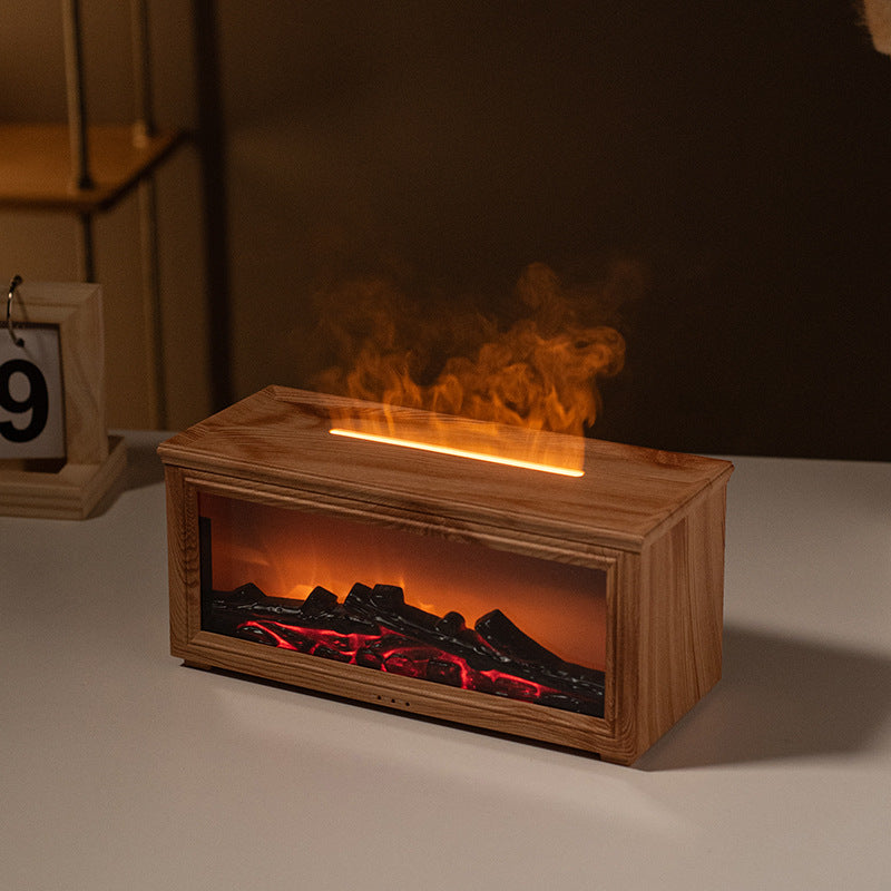 Automatic spray fireplace flame diffuser