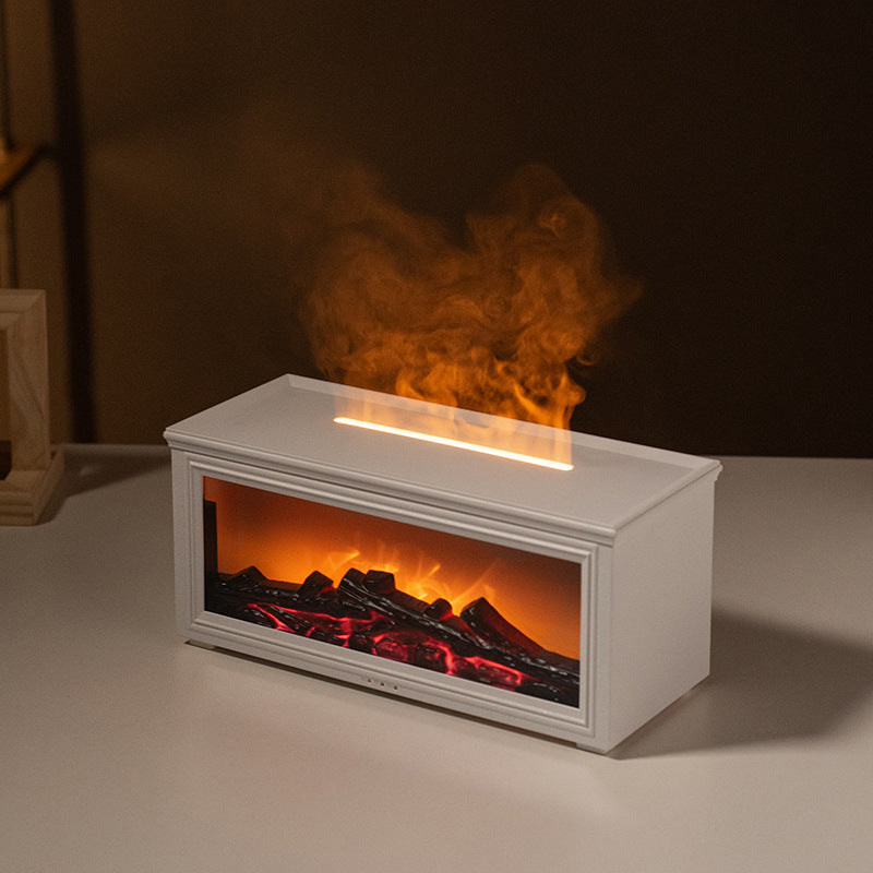 Automatic spray fireplace flame diffuser